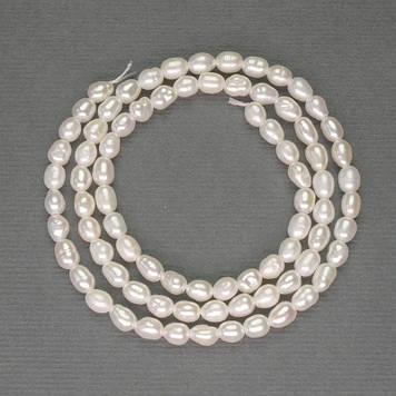 Річкові білі перлини на нитці d-4-4,5х4мм+-на нитці L-37см+-
