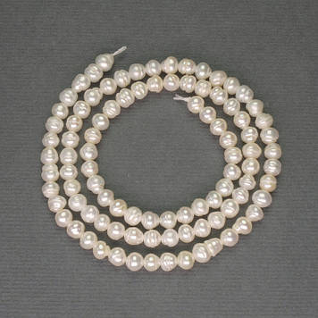 Річкові білі перлини на нитці d-4х3.5мм+-на нитці L-36см+-