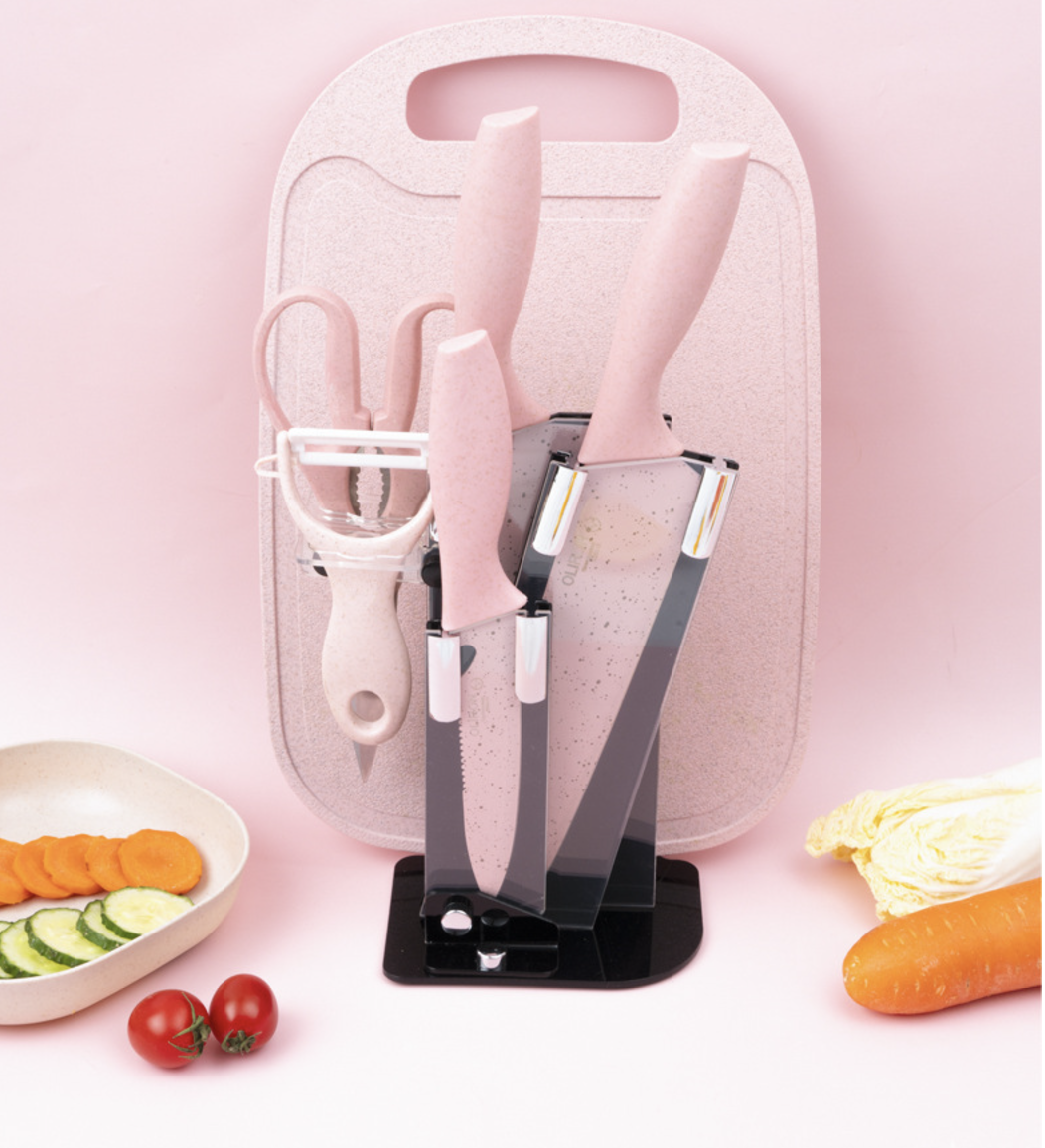 Набір ножів з обробною дошкою на підставці, 7 предметів. Рожевий