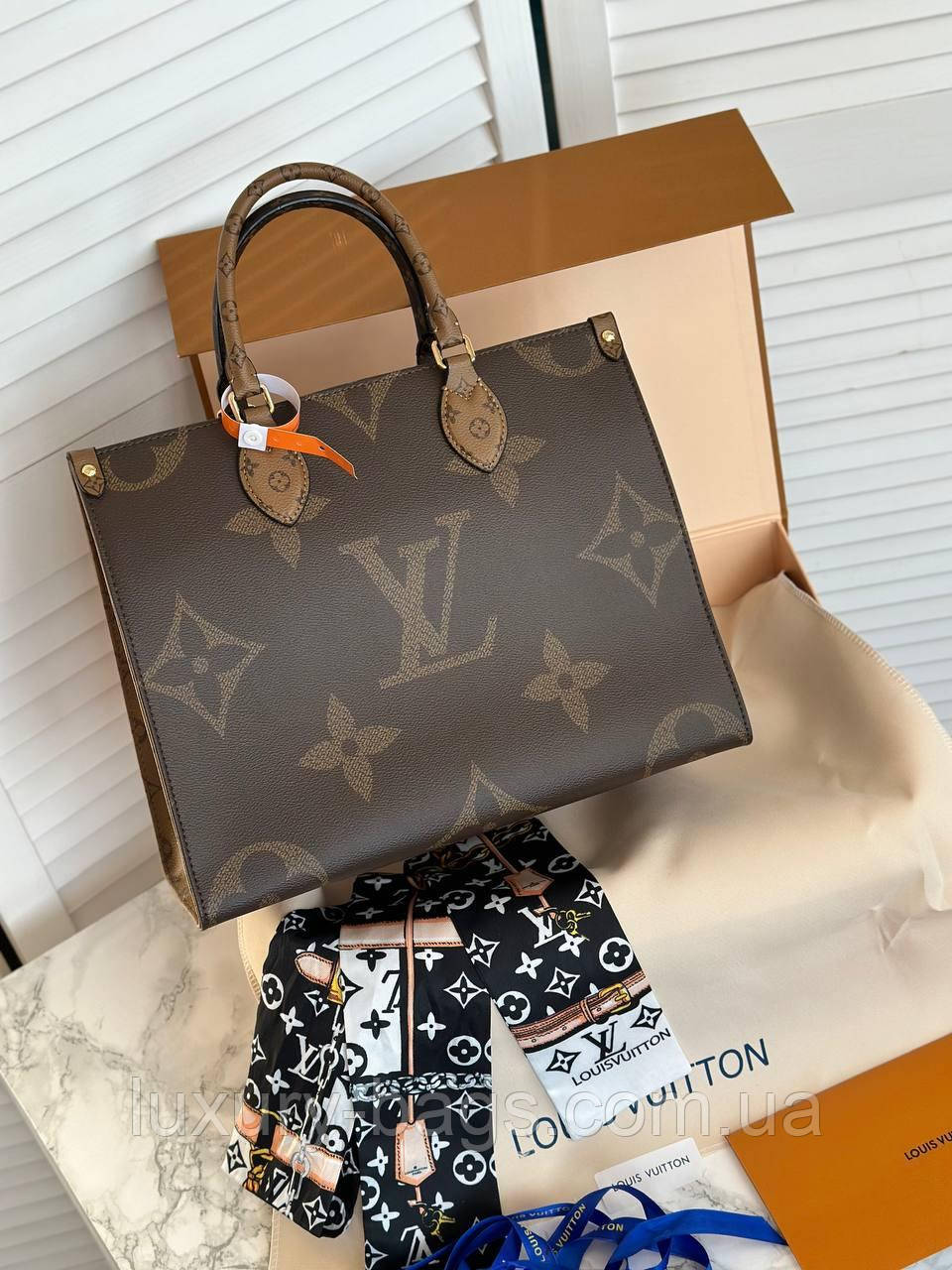 Жіноча сумка Louis Vuitton On The Go PM Monogram, фото 1