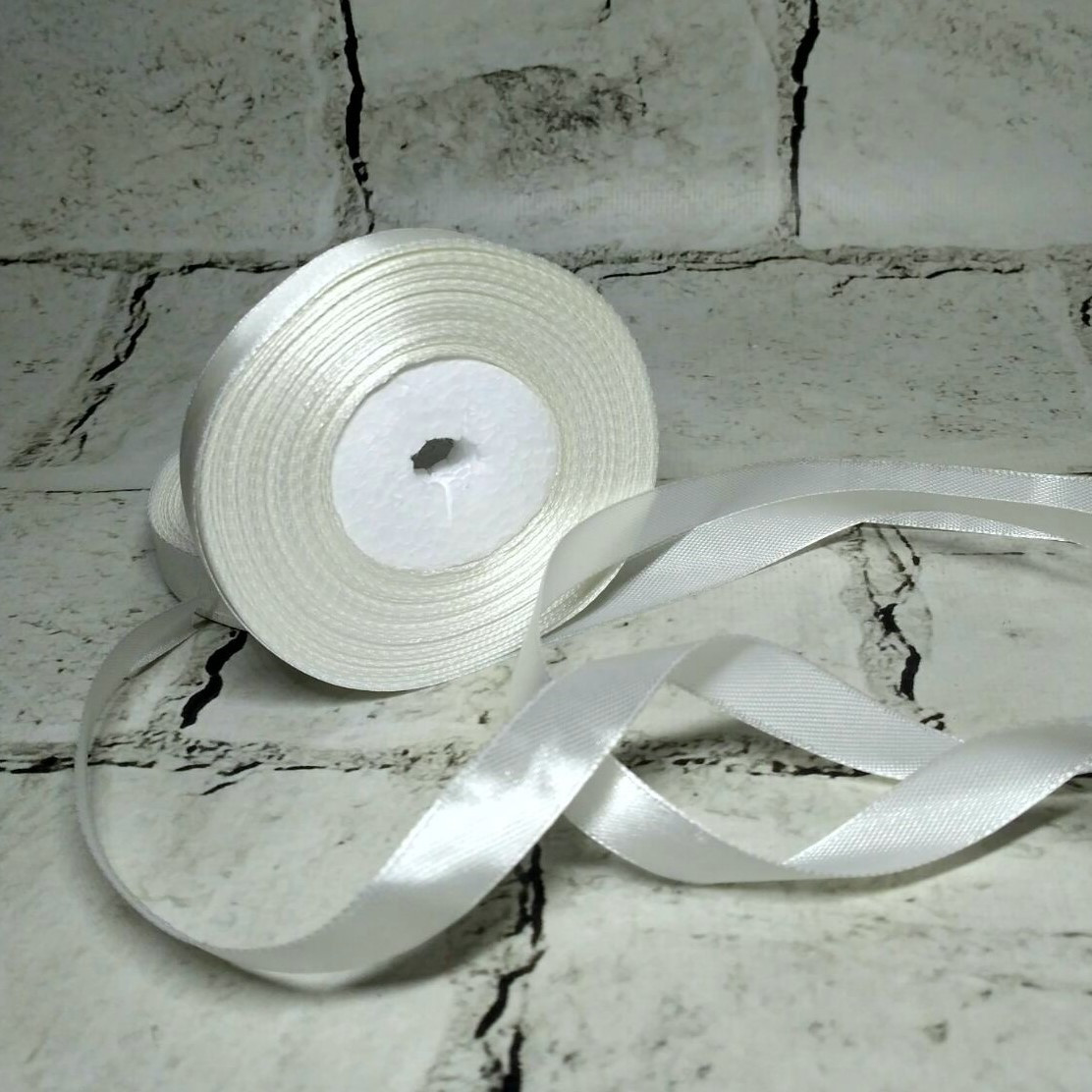 Стрічка атласна 1.2 см 23 метри Молочна 5-85945