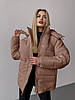 Тепла жіноча молодіжна об'ємна коротка стьобана куртка зі зйомним капюшоном, фото 4