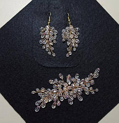 Ніжна гнучка золота гілочка та сережки з кришталіків для зачіски.