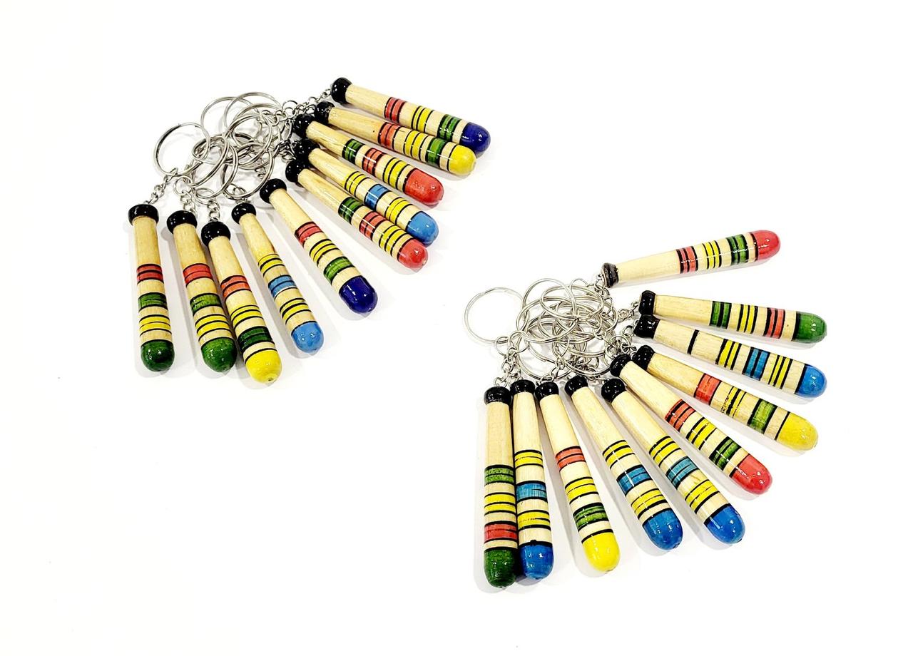 Сувенірні дерев'яні брелки біти