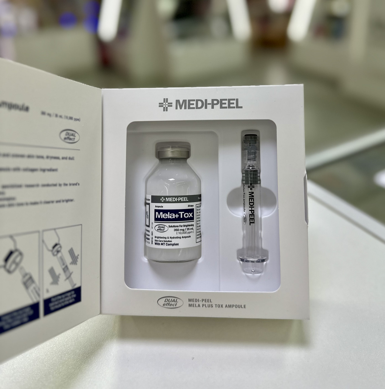 Освітлювальна сироватка для обличчя з ніацинамідом MEDIPEEL Mela Plus Tox Ampoule 35 мл