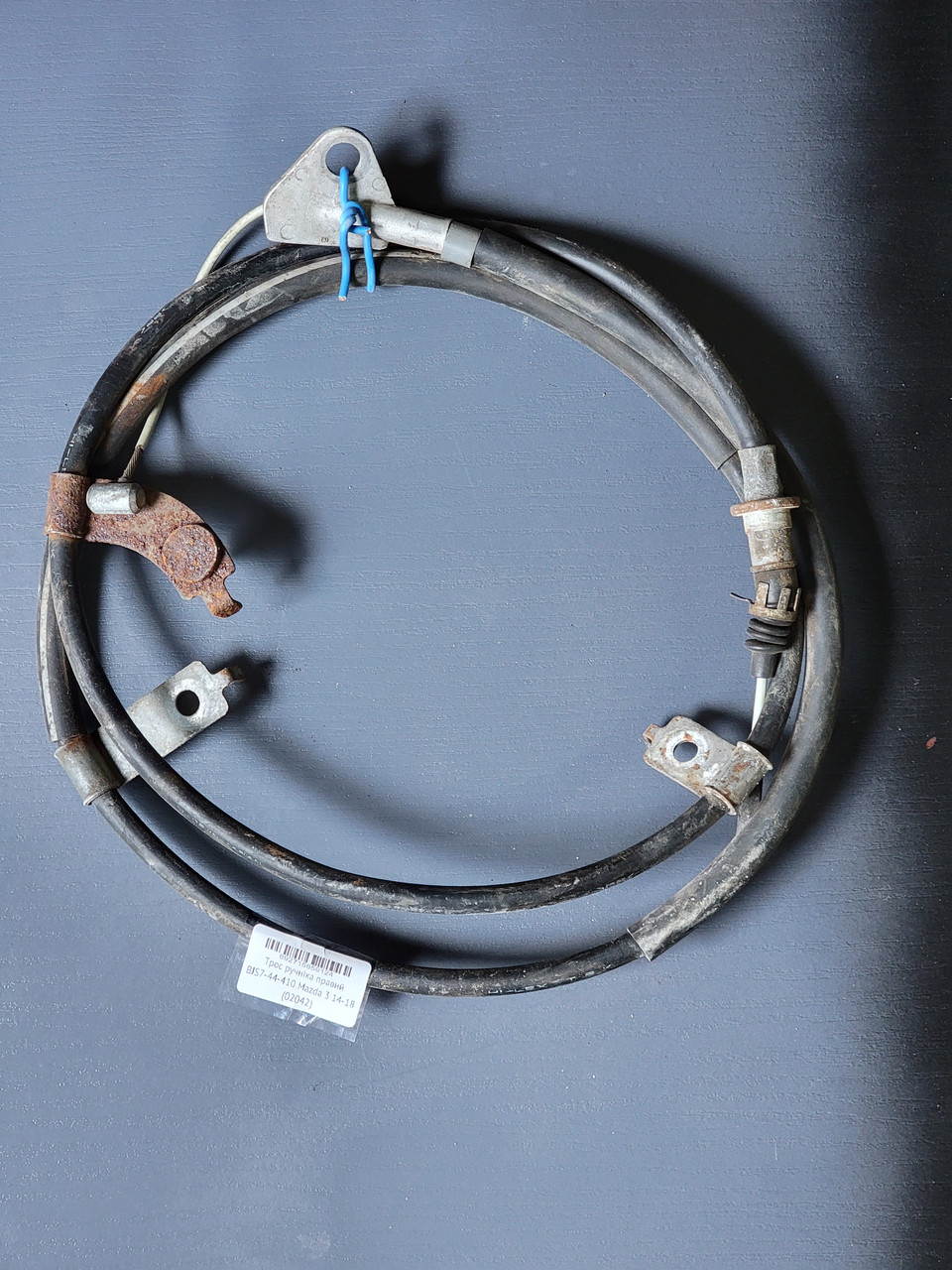 Трос ручніка лівий BJS7-44-420 Mazda 3 14-18 (02041)