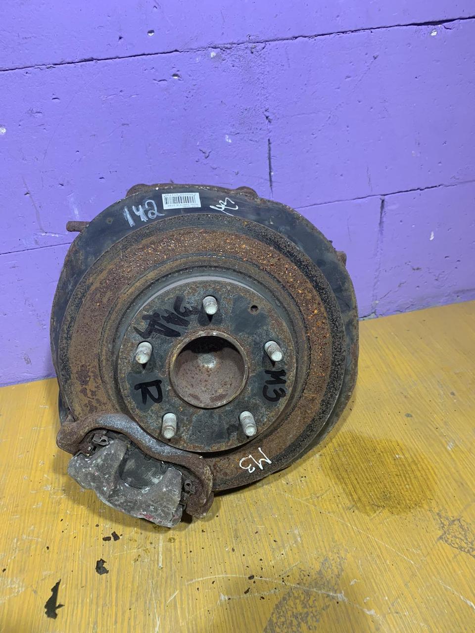 Цапфа з ступицею задня права з кожухом B45A2611X Mazda 3 (01067)