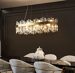 Підвісна овальна люстра із кришталем у латунному корпусі 80х30 см MJ 210 L-800 AB