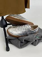 Шкіряні кросівки сріблястого кольору