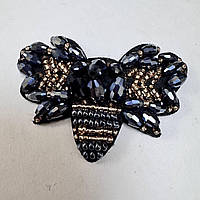 Декоративний нашивний елемент