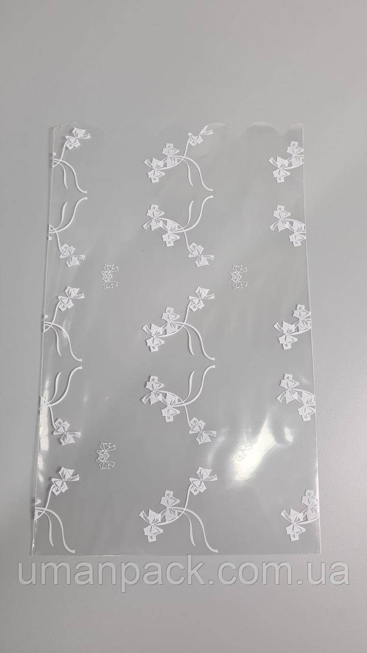 Пакет з малюнком для пакування подарунків (20*35) No383 (7) (ажурний) "Бантик" (100 шт)