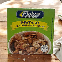 Кальмари в олії з ореганом