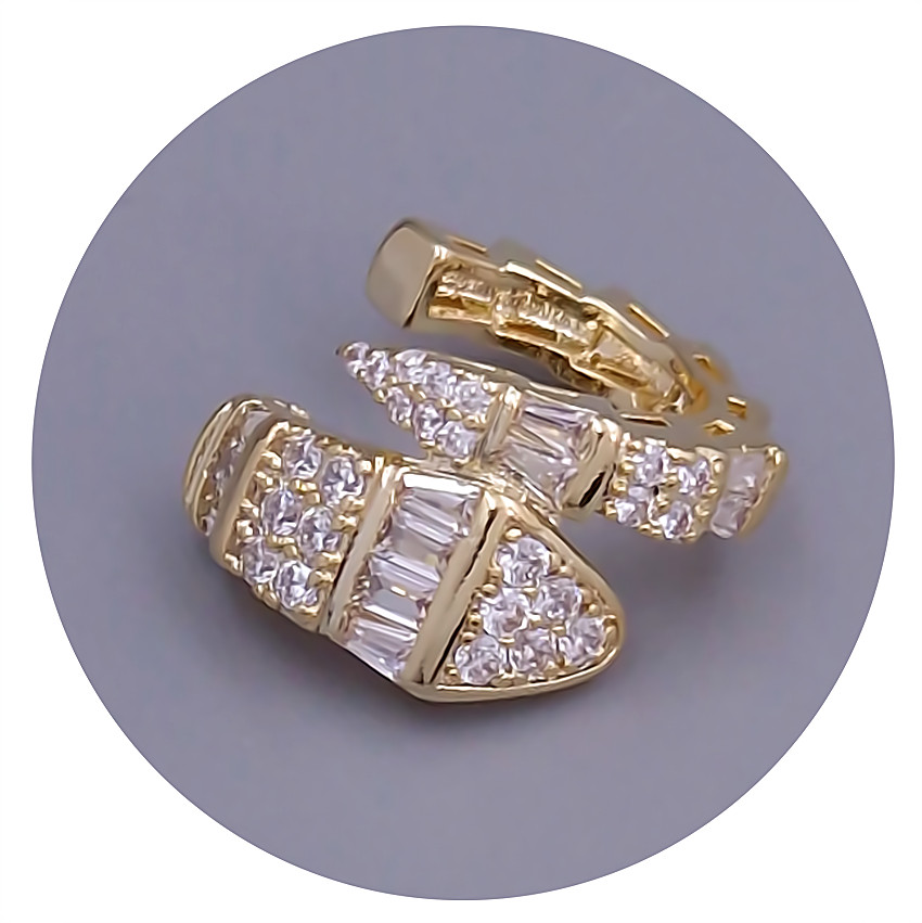 Кафи FJ. Позолота лимонного відтінку. Камені: білий циркон. Довжина: 17 мм. Ширина:10 мм., фото 1