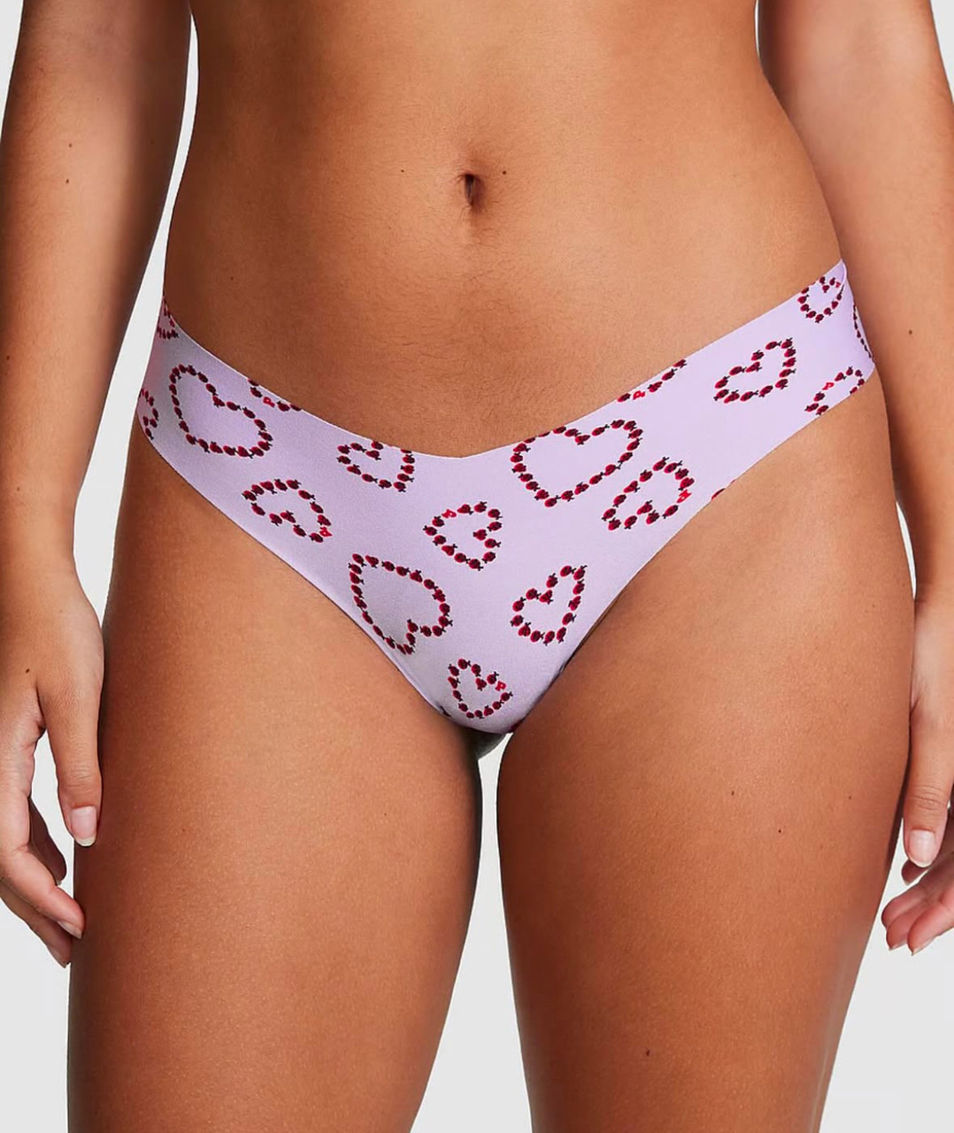 Безшовні трусики-стрінги Victoria's Secret розмір М (рожеві в принт)