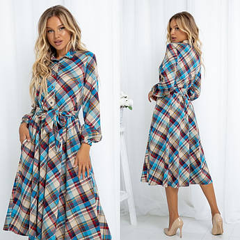 Плаття нижче колін із поясом