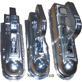 Зчіпні пристрої, головки, замки для причепів