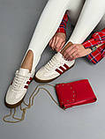 Кеди жіночі шкіряні молочні з червоними смужками, фото 3