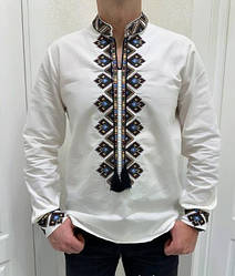 Чоловіча вишита сорочка білого кольору з різнокольоровим вишитим орнаментом розміри S, M, L, XL.