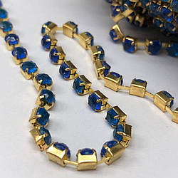 1м - Стразовий ланцюг SS16 (4 мм) Акриловий синій кристал у золоті