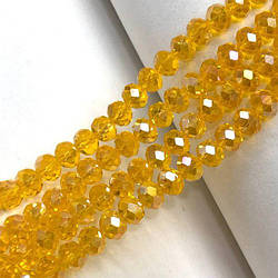 Намистини кришталеві рондель 8х6мм, нитка-65 од, жовтий прозорий з покриттям АВ