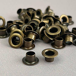 Люверс D-5мм нерж. з пласт. кільцем-антик (100шт) (матр.00254)