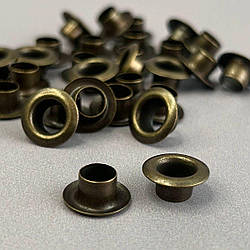 Люверс D-6мм нерж. з пласт. кільцем-антик (100шт) (матр.00255)