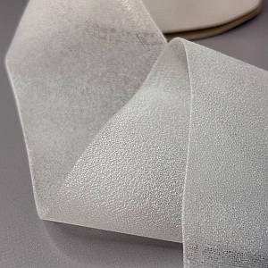 Тасьма клейова для штор під люверси, 10 см - напівпрозора