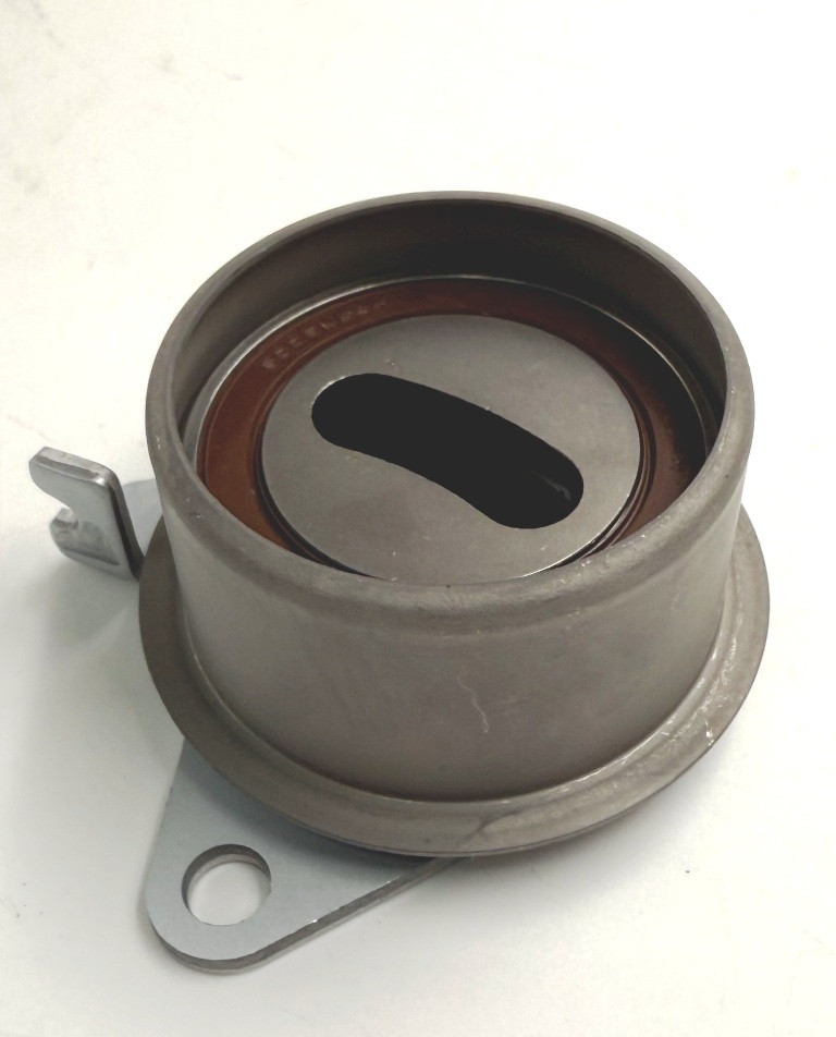 Ролик натягувача ременя ГРМ, оригінал MD356509 LANCER Ланцер