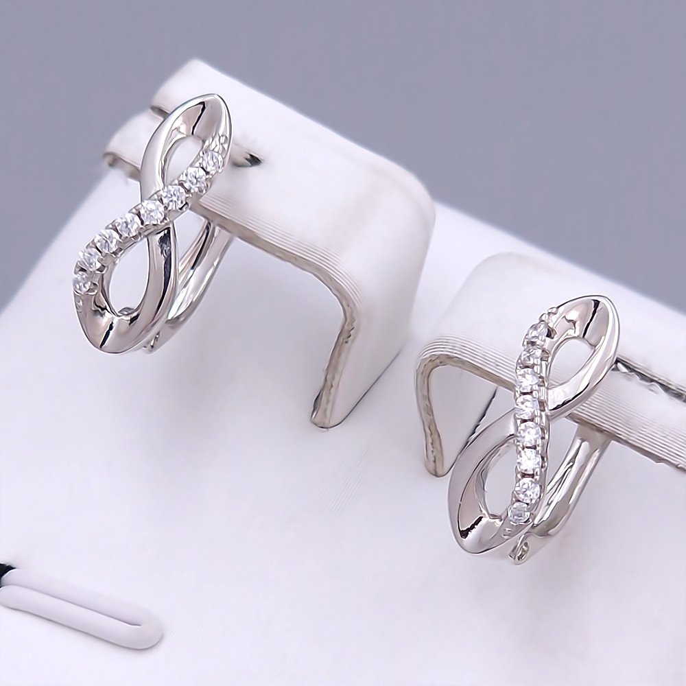 Сережки ХР. Родій. Камені: білий циркон. Довжина: 15 мм. Ширина: 5 мм.