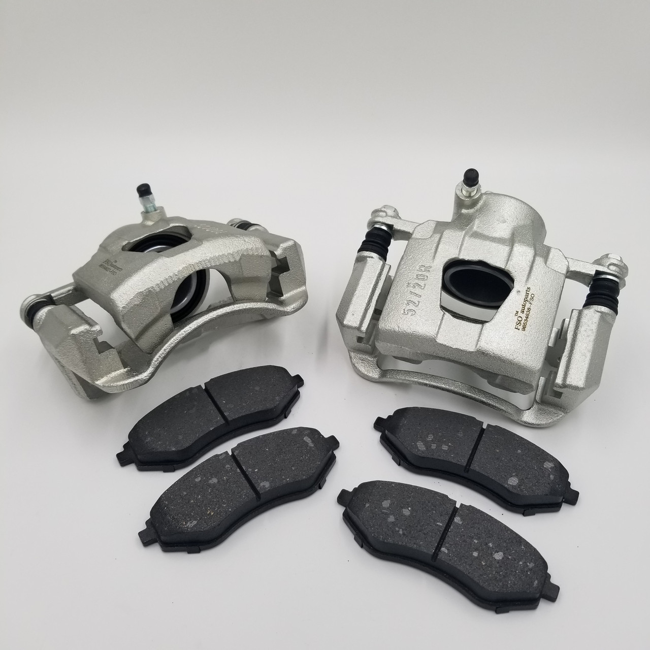 Супорти гальмівні Авео передні (комплект лівий+правий+колодки) FSO Польща