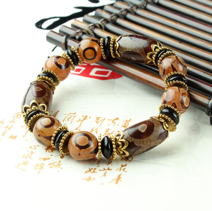 Браслет дев'ять коричневих триочних ДЗД