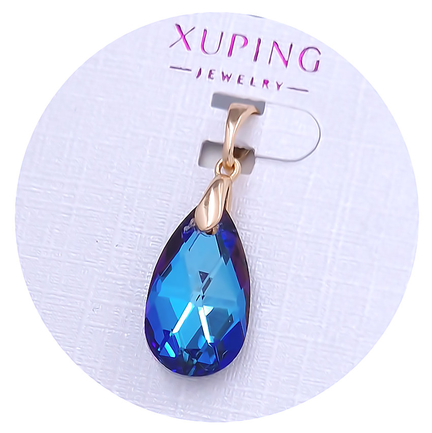 Кулон XР. Позолота 18К. Камені: Swarovski синього кольору. Довжина: 25 мм. Ширина: 10 мм.