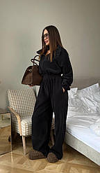 Жіночий комбез з блискавкою чорного кольору