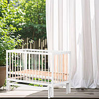 Дитяче ліжечко з опускаючою боковиною для комфортного сну малюка маятниковий механізм колір білий натуральний