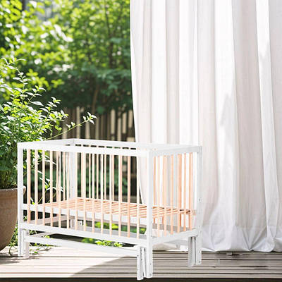 Дитяче ліжечко з опускаючою боковиною для комфортного сну малюка маятниковий механізм колір білий натуральний