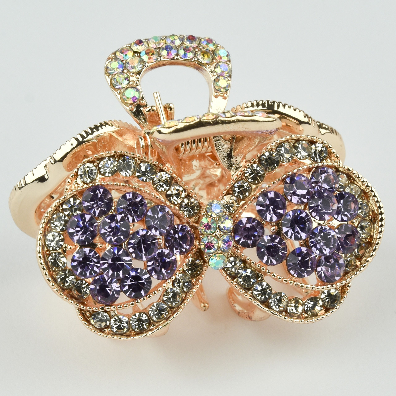 Шпилька краб металевої фірми Zaya золотистого кольору бантик із фіолетовими стразами розмір 30Х35х30 мм