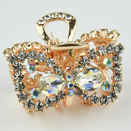 Шпилька краб металевої фірми Zaya золотистого кольору бантик із переливними стразами розмір 25х30х25 мм, фото 1