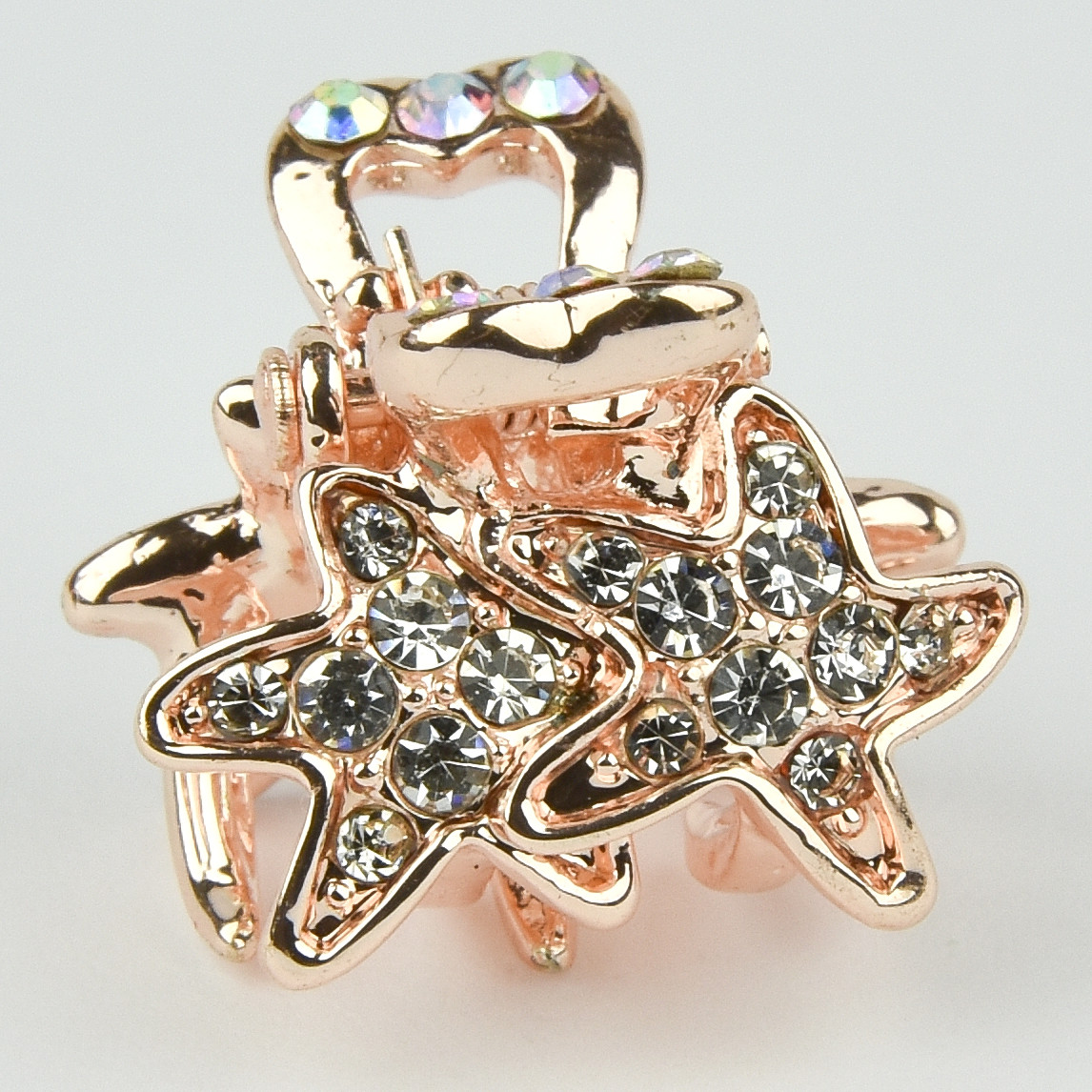 Шпилька краб металевої фірми Zaya золотистого кольору зірочки з білими кристалами розмір 15х17х15 мм