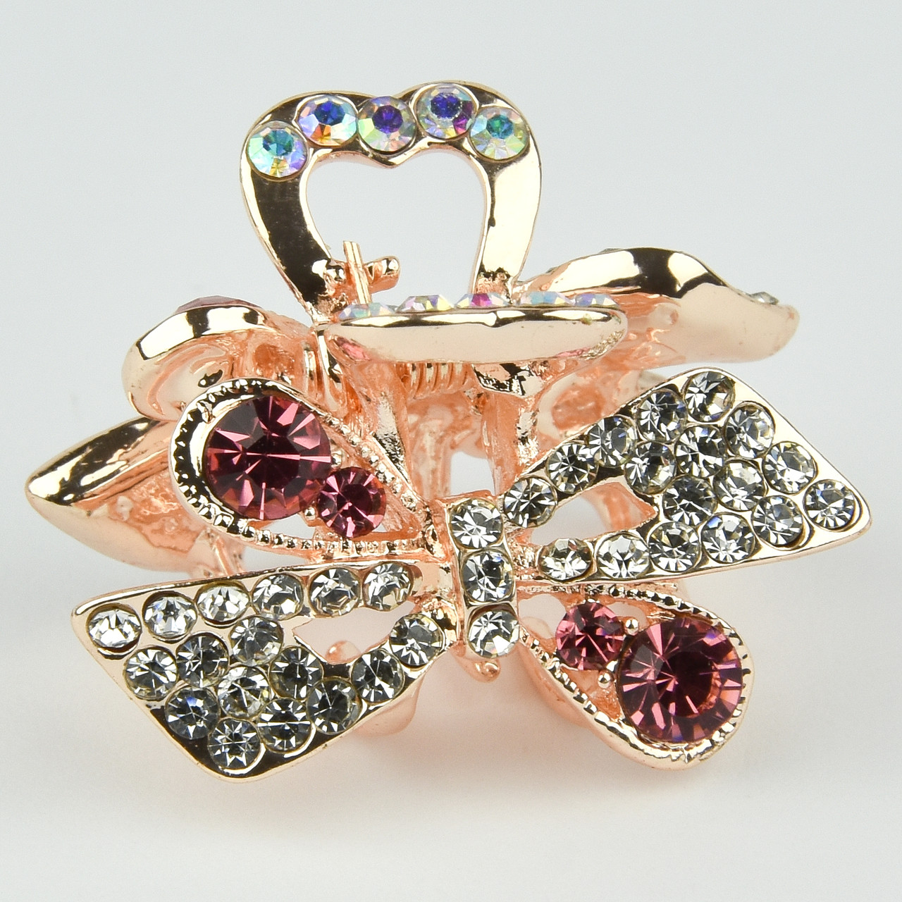 Шпилька краб металевої фірми Zaya золотистого кольору бантик із рожевими камінчиками розмір 20Х30х20 мм