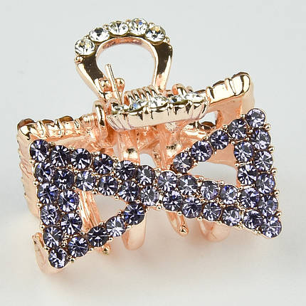 Шпилька краб металевої фірми Zaya золотистого кольору бантик із фіолетовими кристалами розмір 15х20х15 мм, фото 1