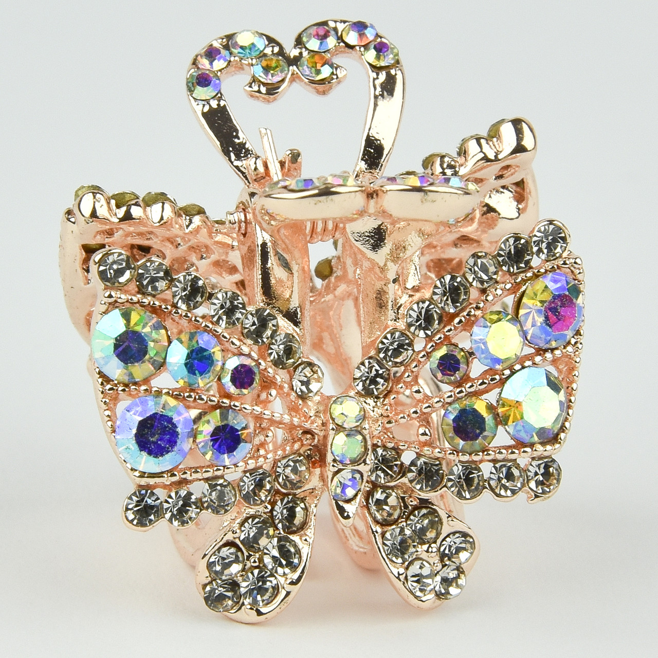 Шпилька краб металевої фірми Zaya золотистого кольору бантик із мінливими стразами розмір 25Х25х25 мм