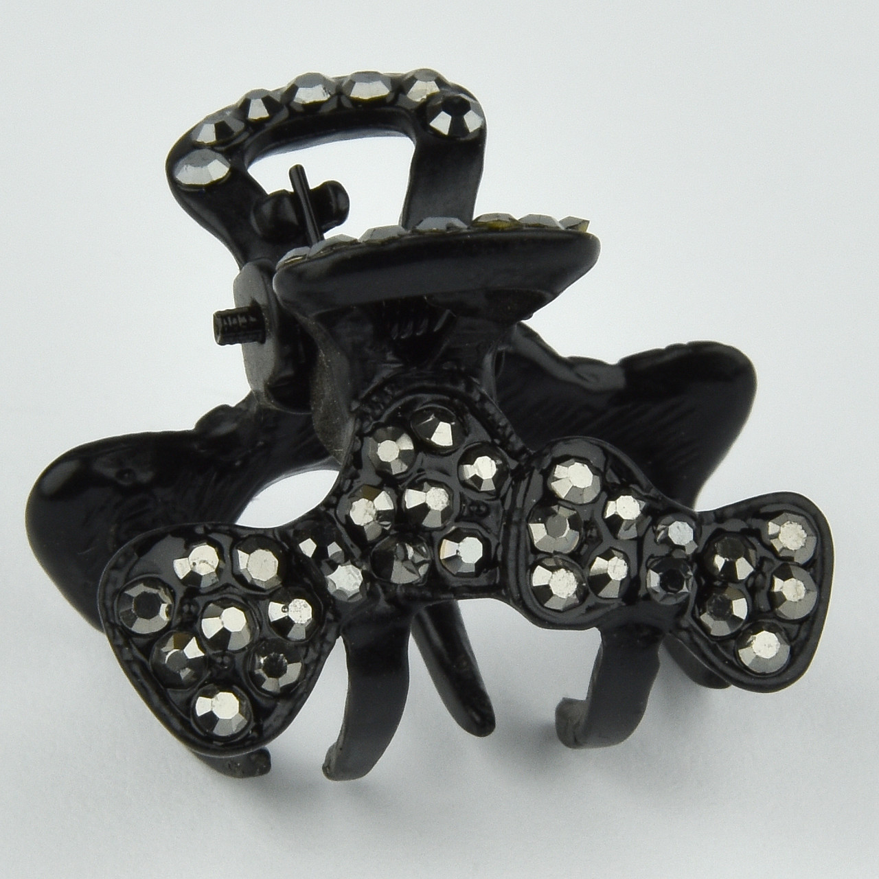 Шпилька краб металевої фірми Zaya чорного кольору бантики із сірими кристалами розмір 20Х25х20 мм