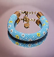 Браслет голубий з мілкими квіточками з японського бісеру