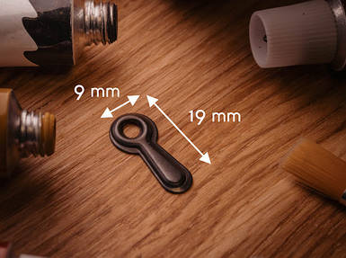 Фіксатор для рамок металевий. 20х9мм