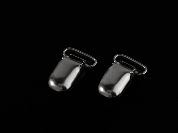 Затискач. 32мм. Під стрічку 20мм