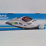 Іграшка електричка інерційна зі світлом та звуком в коробці RJ050 розмір 35 см, фото 6