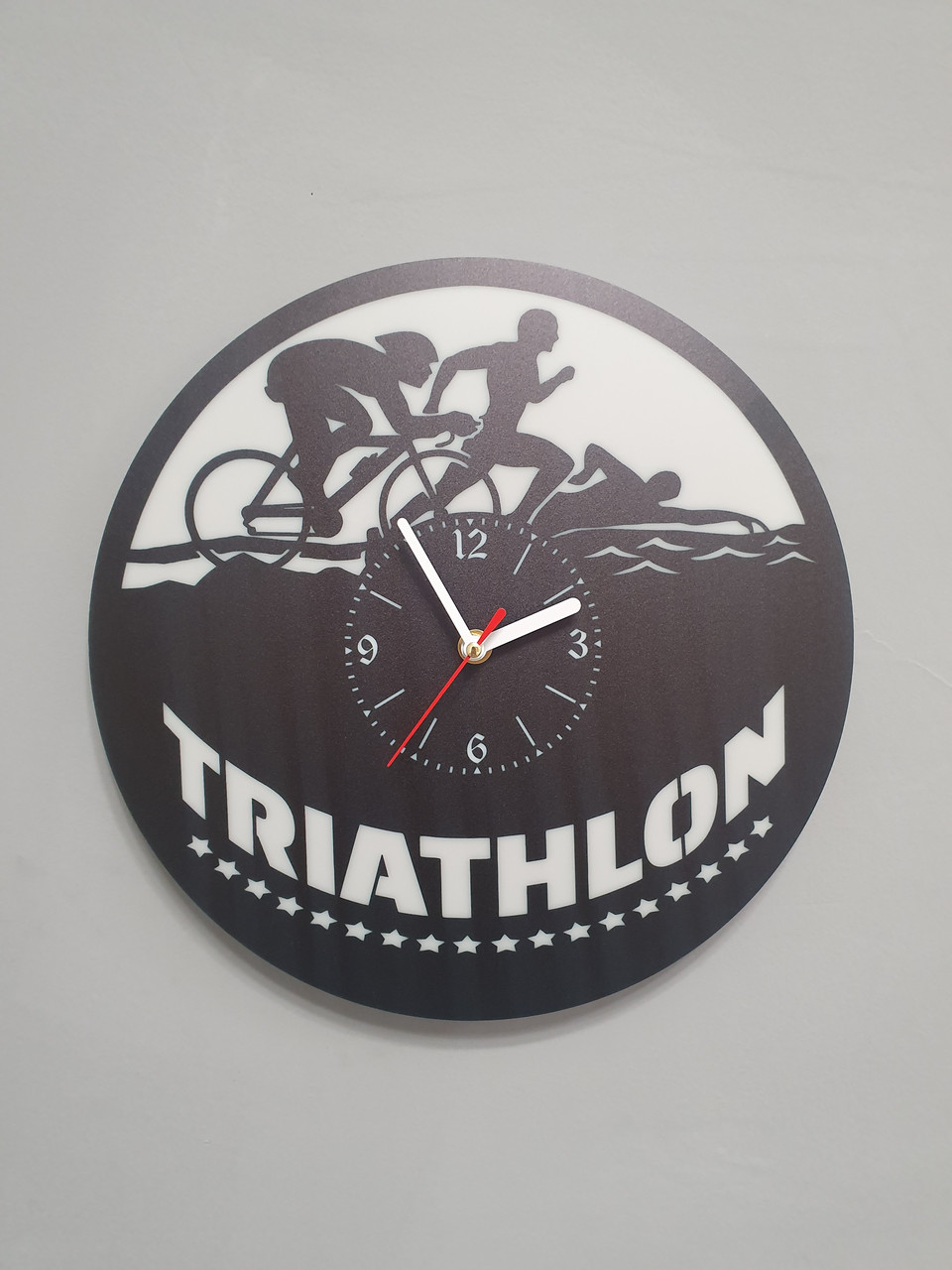 Настінний годинник Тріатлон