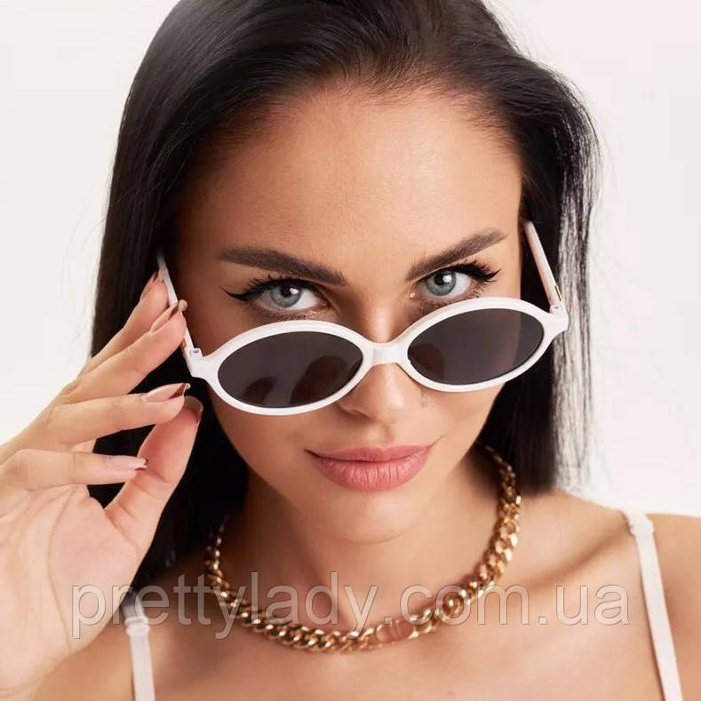 Сонцезахисні окуляри овальні Oculos чорні з білим