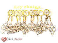 Брелок-підвіска металевий золотистий із кристалами на день закоханих. Подарунок коханим.