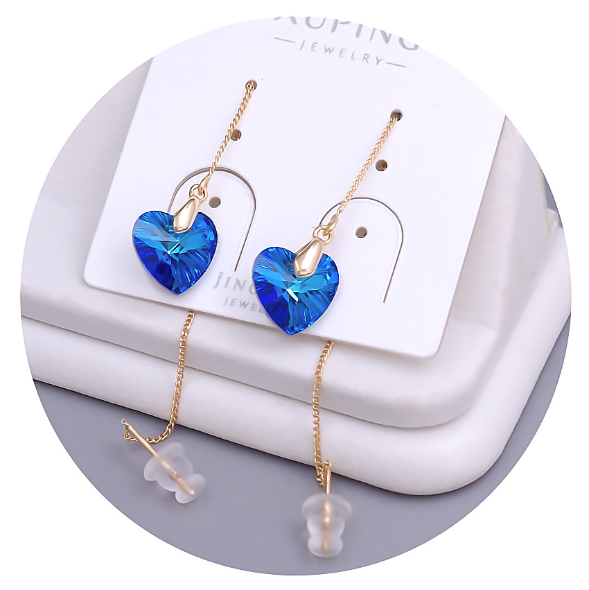 Сережки-протяжки XР. Позолота 18К. Камені: Swarovski синього кольору. Довжина: 90 мм. Ширина: 10 мм.
